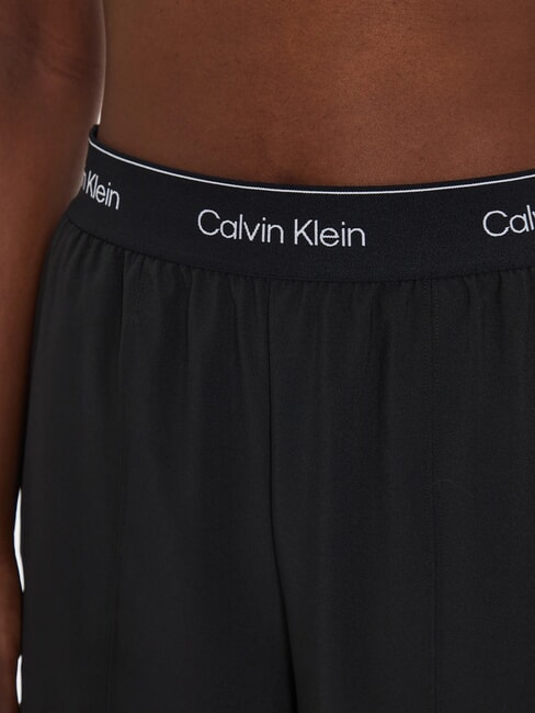 CK PERFORMANCE Palazzohose mit Logo-Gummizug schwarze Schönheit - Sportanzüge für Damen