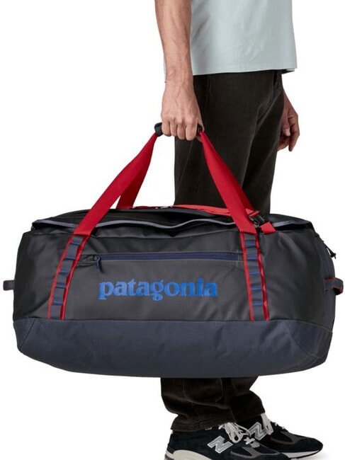 BLACK HOLE Reisetasche / Rucksack schwelen blau mit roten Knollenbl&auml;tterpilzen - Reisetaschen